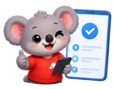 Koala giving a thumbs up next to a phone